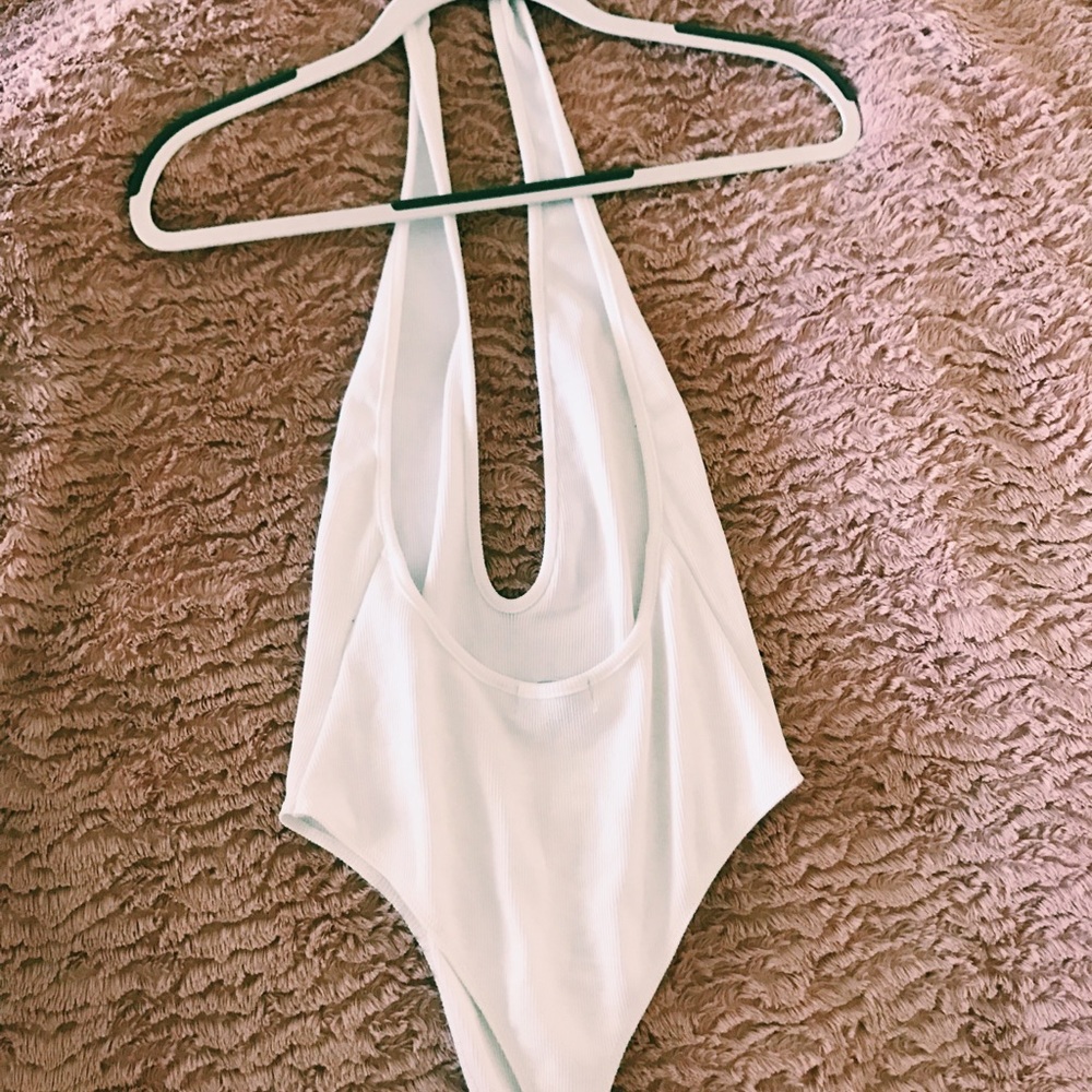 Stylish white body suit